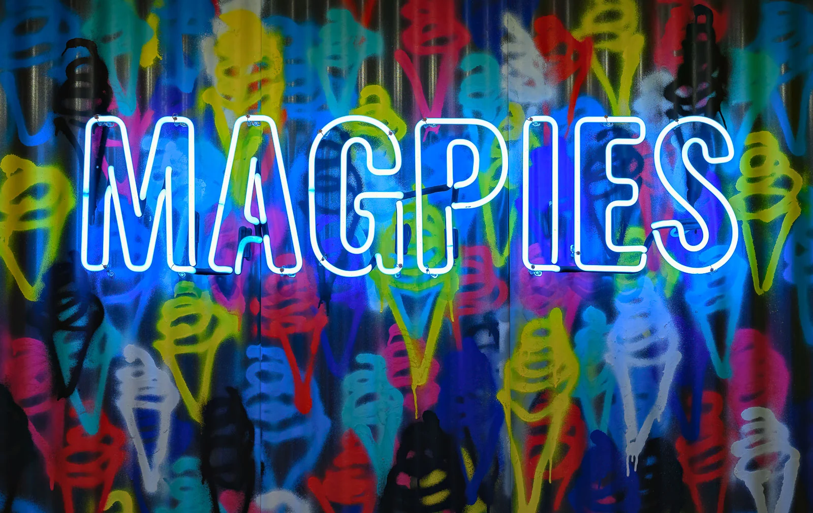 Magpies Graffiti Wall with Neon Sign