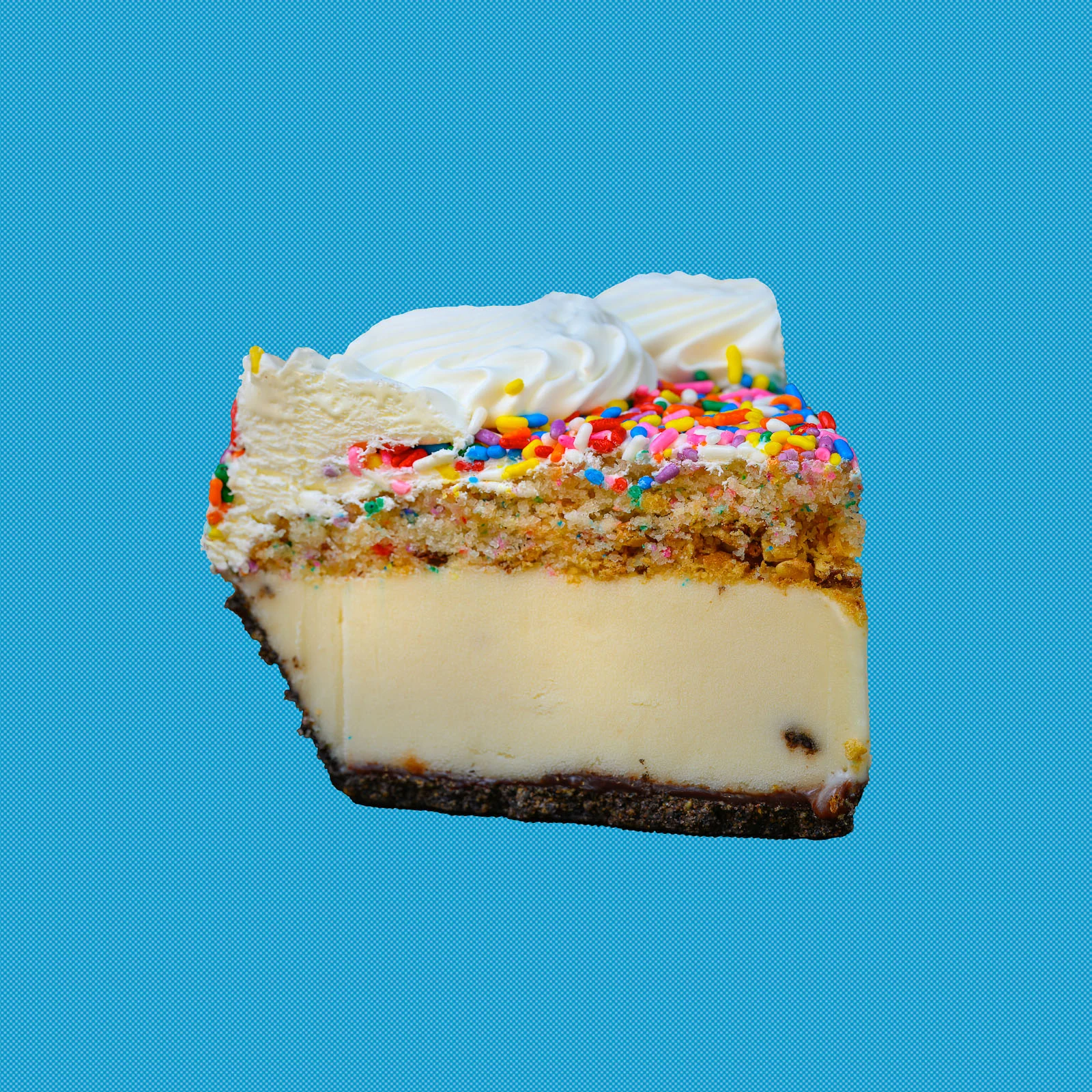 Slice of pale Softserve Pie topped with rainbow sprinkles on a blue background