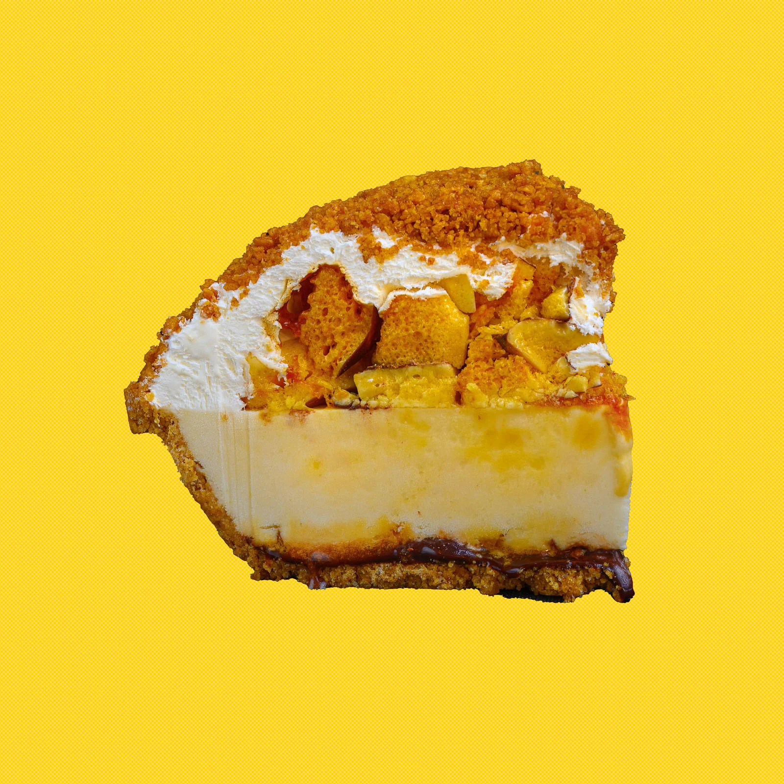 Softserve Pie slice topped with crunchy waffle pieces on a yellow background