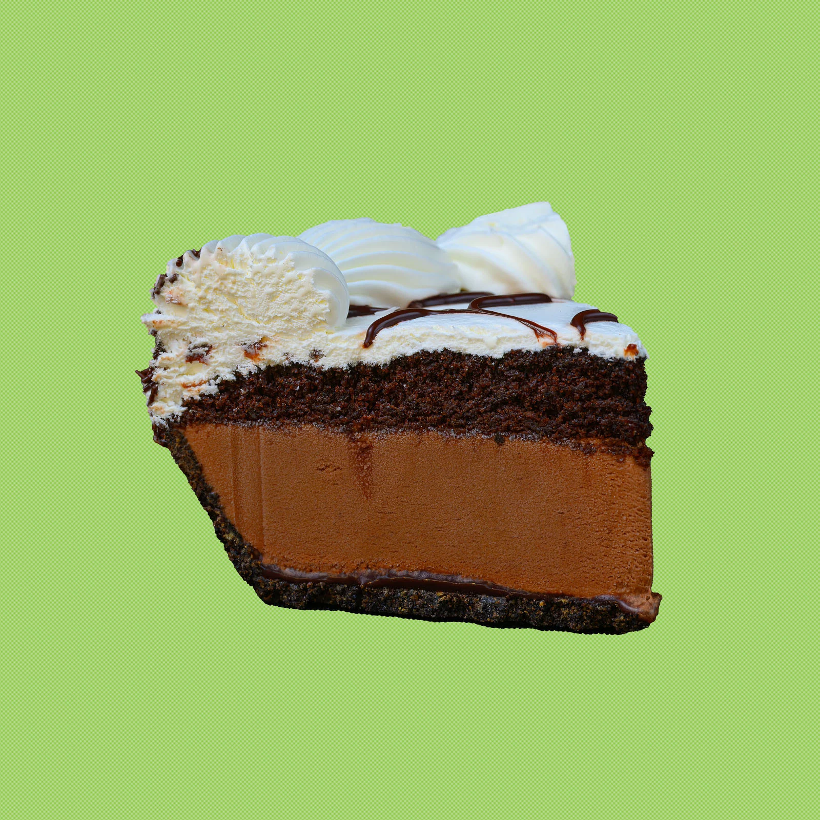 Softserve Pie slice with chocolate filling and chocolate drizzle on a green background