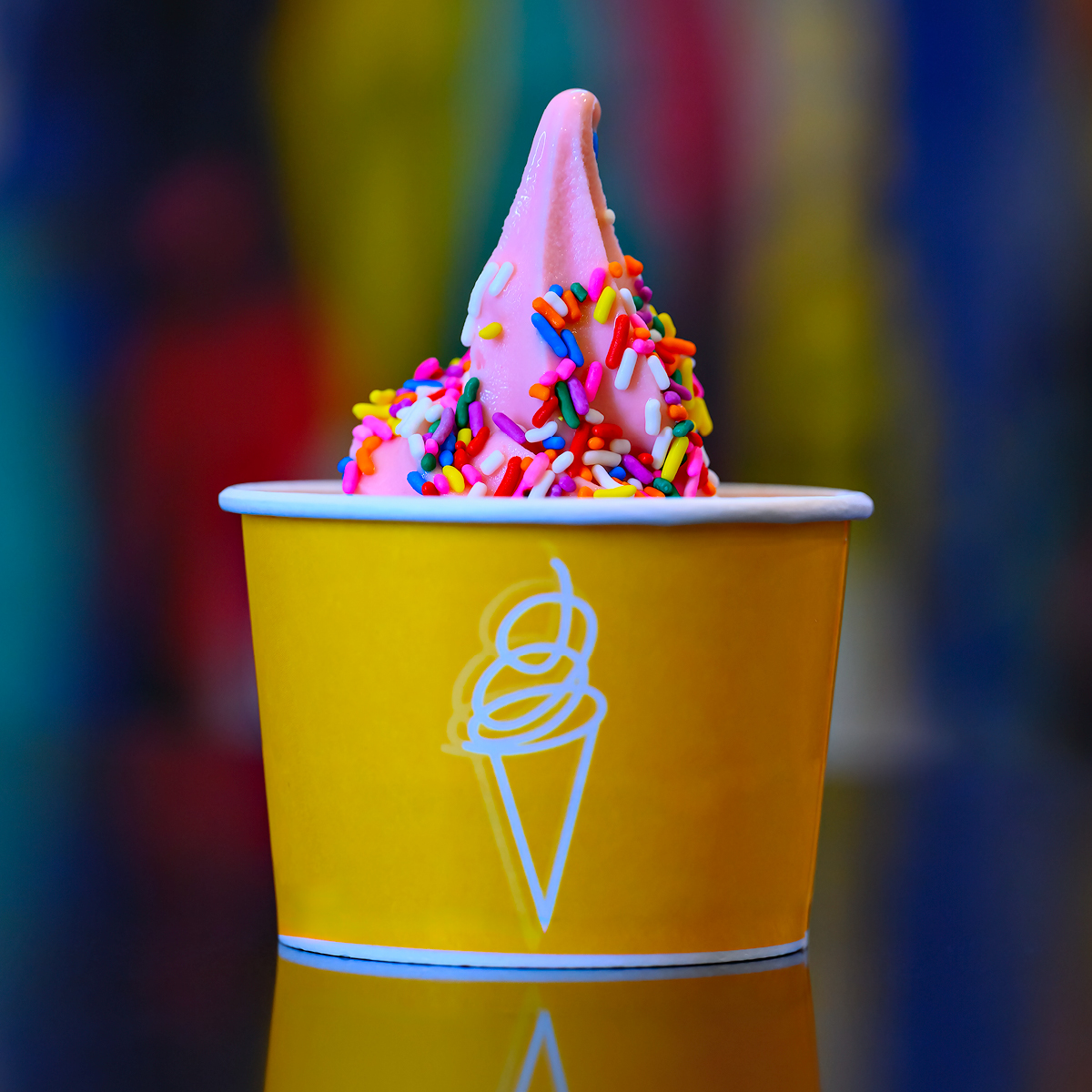 Cup of strawberry Softserve with sprinkles